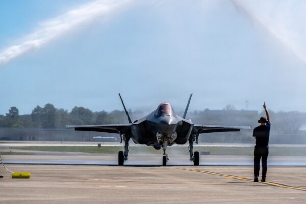 The first German Air Force F-35 Lightning II taxis under a water-cannon salute at Ebbing Air National Guard Base in Fort Smith, Arkansas