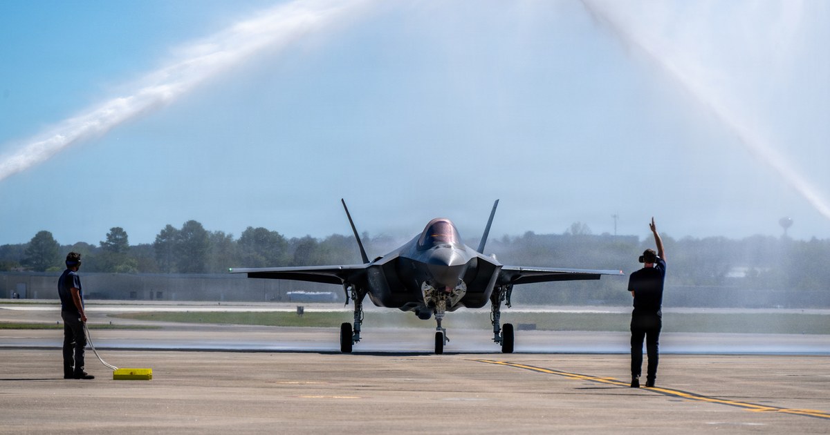 The first German Air Force F-35 Lightning II taxis under a water-cannon salute at Ebbing Air National Guard Base in Fort Smith, Arkansas