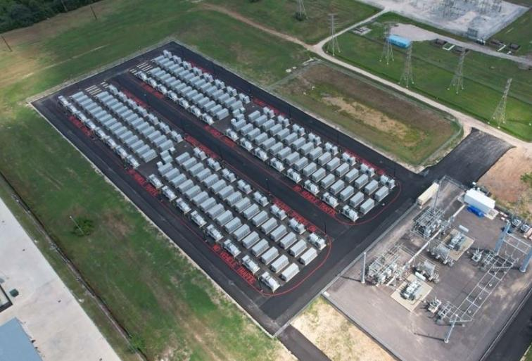 Aerial photo of an example battery storage plant beside a substation