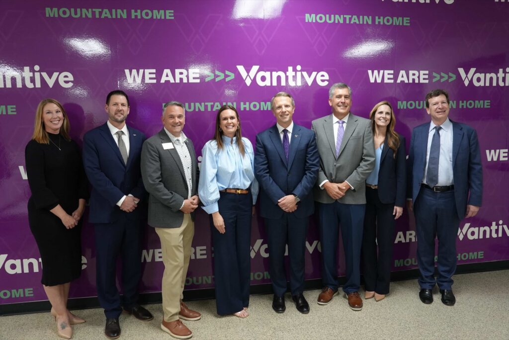 Gov. Sarah Huckabee Sanders with Vantive and local leaders in front of a Vantive backdrop in Mountain Home